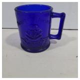 Blue glass humpty dumpy cup