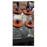 Set of 4 canister jars with wooden lids
