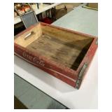 vintage wooden Coca-Cola bottle crate.