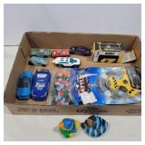 Small toy cars and ducks