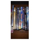 Bag of 34 dvds some Disney