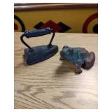 Cast iron frog and sad iron.