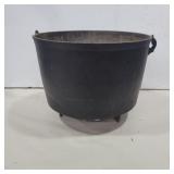 Cast iron footed pot 10in diameter and 7.5in tall