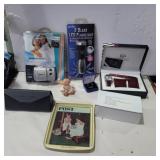 Vivitar camera, watch set, earrings, flashlight