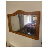 Wall mirror with wooden frame