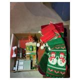 Christmas stockings and plastic miniature