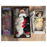 Porcelain collector dolls and clown