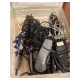 Electric shavers and curling irons in tote