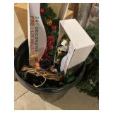 Can full of holiday decor,including wreaths, 24