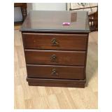 Traditional three-drawer nightstand w/ glass top