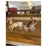 porcelain horse-drawn carriage figurine