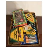 Lot of assorted crayons and writing utensils
