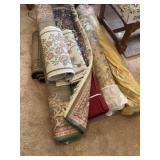 Seven throw rugs are various sizes