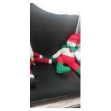 Sitting snowman and santa dolls