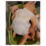 Tote of baby dolls