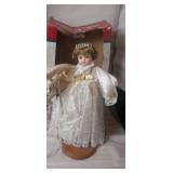 Trim a homen Animated porcelain angel 22in