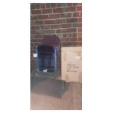 Area rug , 2 metal folding chairs and wooden