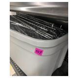 Tote full of stainless steel wire pegboard shelf