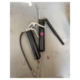 Two manual grease guns