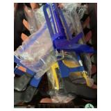 Various hand, saws, caulk, gun, and crowbar