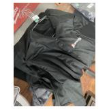 Five Spartan mowers polos, three large and two