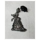 Lady with a parasol brooch marked Spain