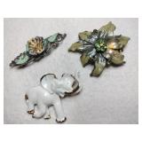 3 enamel metal brooches