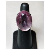 Silver purple stone ring marked 10K Sterling