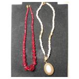 Red beaded necklace pink locket Marked 1928