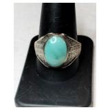 Silver turquoise  ring.  Marked 925.  Size 10.