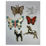 Butterfly and horse brooches different styles