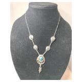 Silver Navajo bear claw necklace marked Sterling.