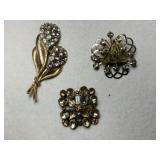 3 goldtone clear/ yellow rhinestone brooches