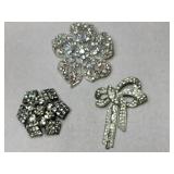 3 silvertone clear rhinestone brooches