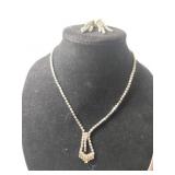 Silvertone clear rhinestone necklace with screw