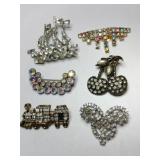 Gold and silver clear rhinestone brooches