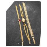 3 gold tone 2 mesh bracelets one clear rhinestone