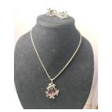 Sarah Coventry silver tone purple rhinestone