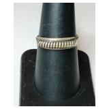Silver decorative band ring.   size 7.5.   .070oz