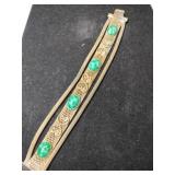 Gold tone metal mesh bracelet green stones