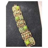 Gold tone selro link green sugar loaf cabochons