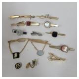 Tie clips and us navy pin and beta junior pin