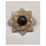 Silvertone and Onyx Blooming Star Brooch