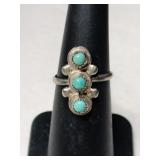 Silver Navajo turquoise Ring size 5.    .095oz