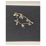 Silver Charm Bracelet marked 925  18 grams