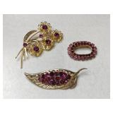 3 gold tone purple rhinestone brooches