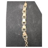 Sarah Coventry gold tone smoky quartz link