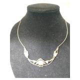 Silver Mexican blonde shell necklace signed.