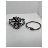 Pair of metal cuff bracelets