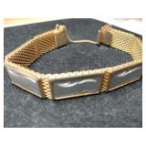 Gold tone white mesh panel bracelet with safety